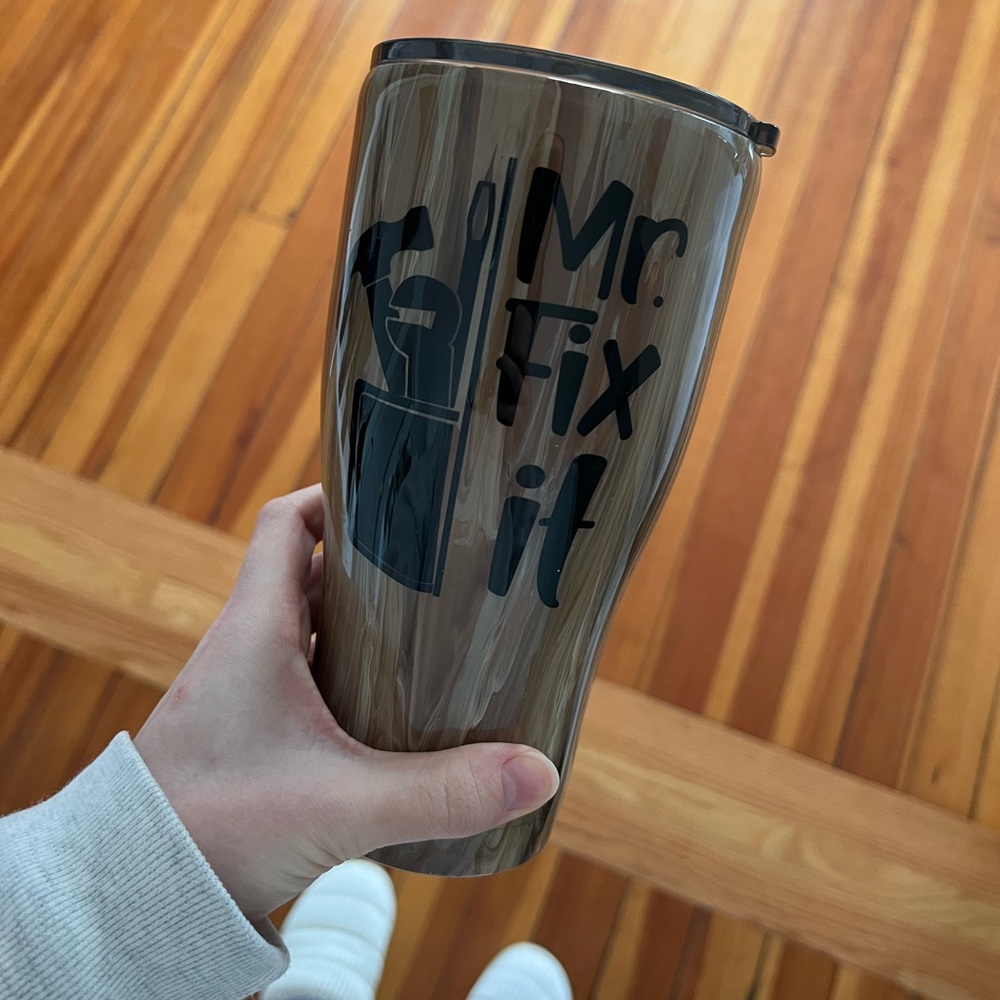 Mr. fix it tumbler mug. Never been used.